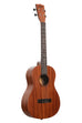 A Kala Learn To Play Ukulele Baritone Starter Kit shown at a right angle