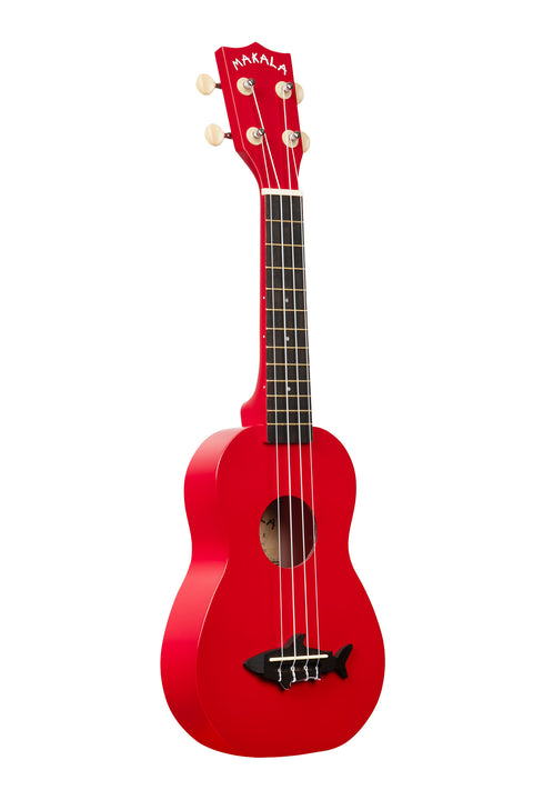 A Red Sea Soprano Shark Ukulele shown at a right angle