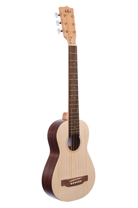 A Solid Spruce Top Travel Guitar with Steel Strings shown at a right angle