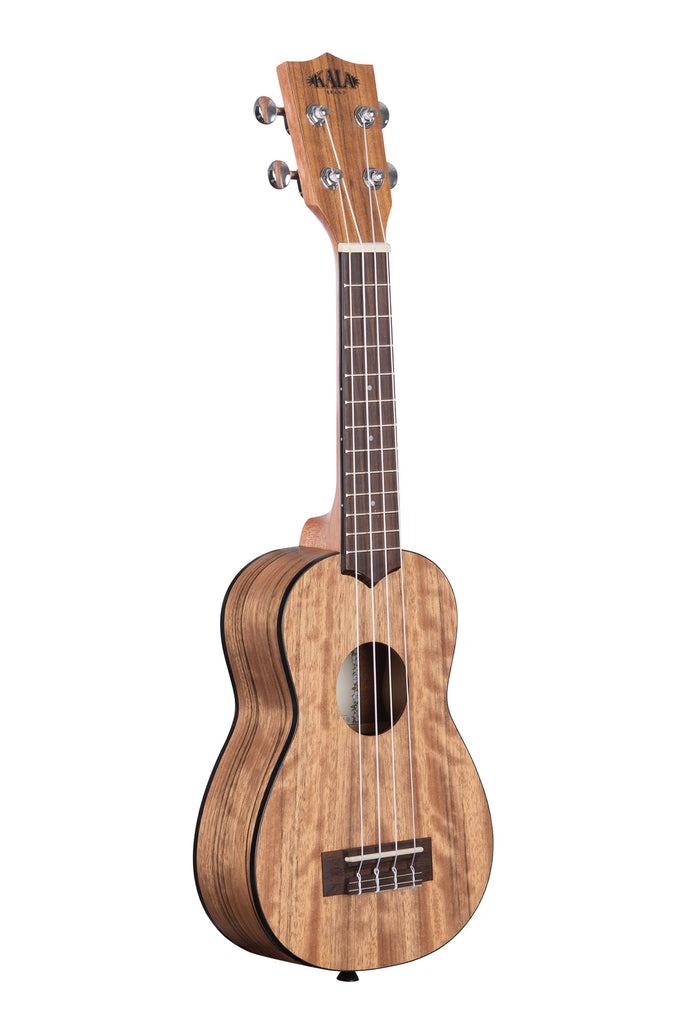 A Pacific Walnut Soprano Ukulele shown at a right angle
