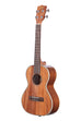 A Gloss Mahogany Tenor Ukulele shown at a left angle