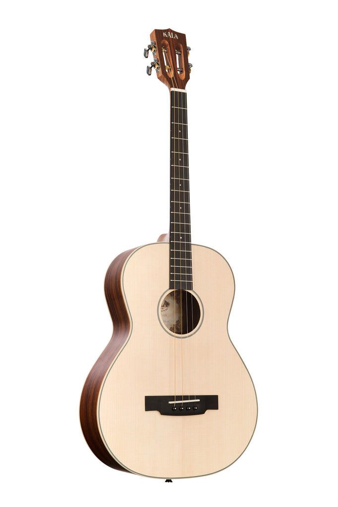 A Solid Spruce Top Pau Ferro Tenor Guitar shown at a right angle