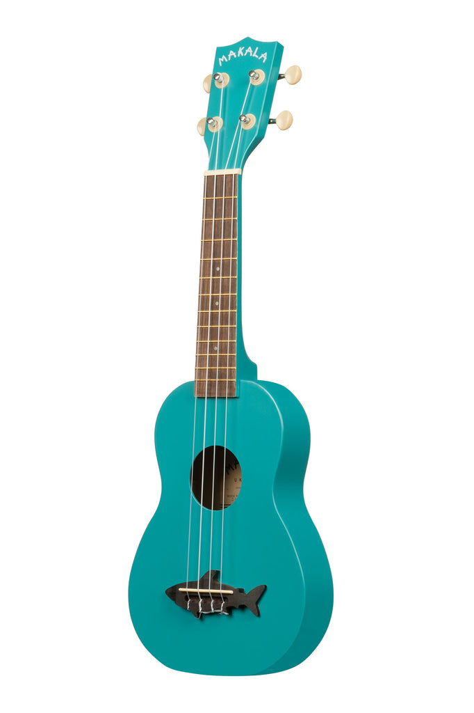 A Mako Blue Soprano Shark Ukulele shown at a left angle