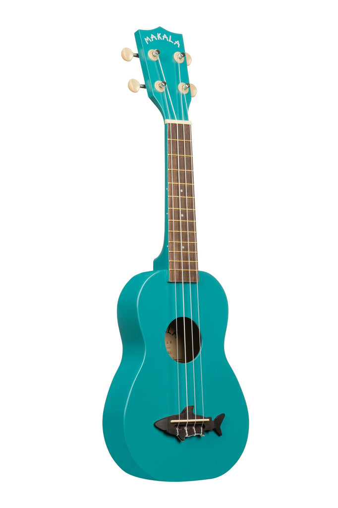 A Mako Blue Soprano Shark Ukulele shown at a right angle