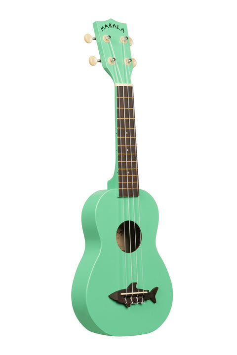 A Surf Green Soprano Shark Ukulele shown at a right angle