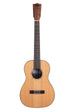 A Gloss Solid Cedar Top Acacia Baritone Ukulele shown at a front angle
